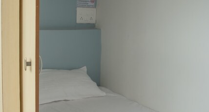 Monkey cap Tourist Room Type - Female Solo Bed - AC Pod