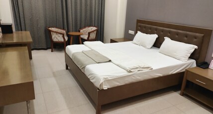 ATHARAV HOTELS Room Type - Standard Room with Garden View ATHARAV HOTELS Room Type - Standard Room with Garden View