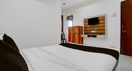 Hotel O Sai Teerth Theme Park Formerly Sai Dhanlaxmi Room Type - Deluxe with Twin Bed Hotel O Sai Teerth Theme Park Formerly Sai Dhanlaxmi Room Type - Deluxe with Twin Bed