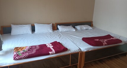 Hotel aman inn and restaurant Room Type - Non AC basic four bed room 8