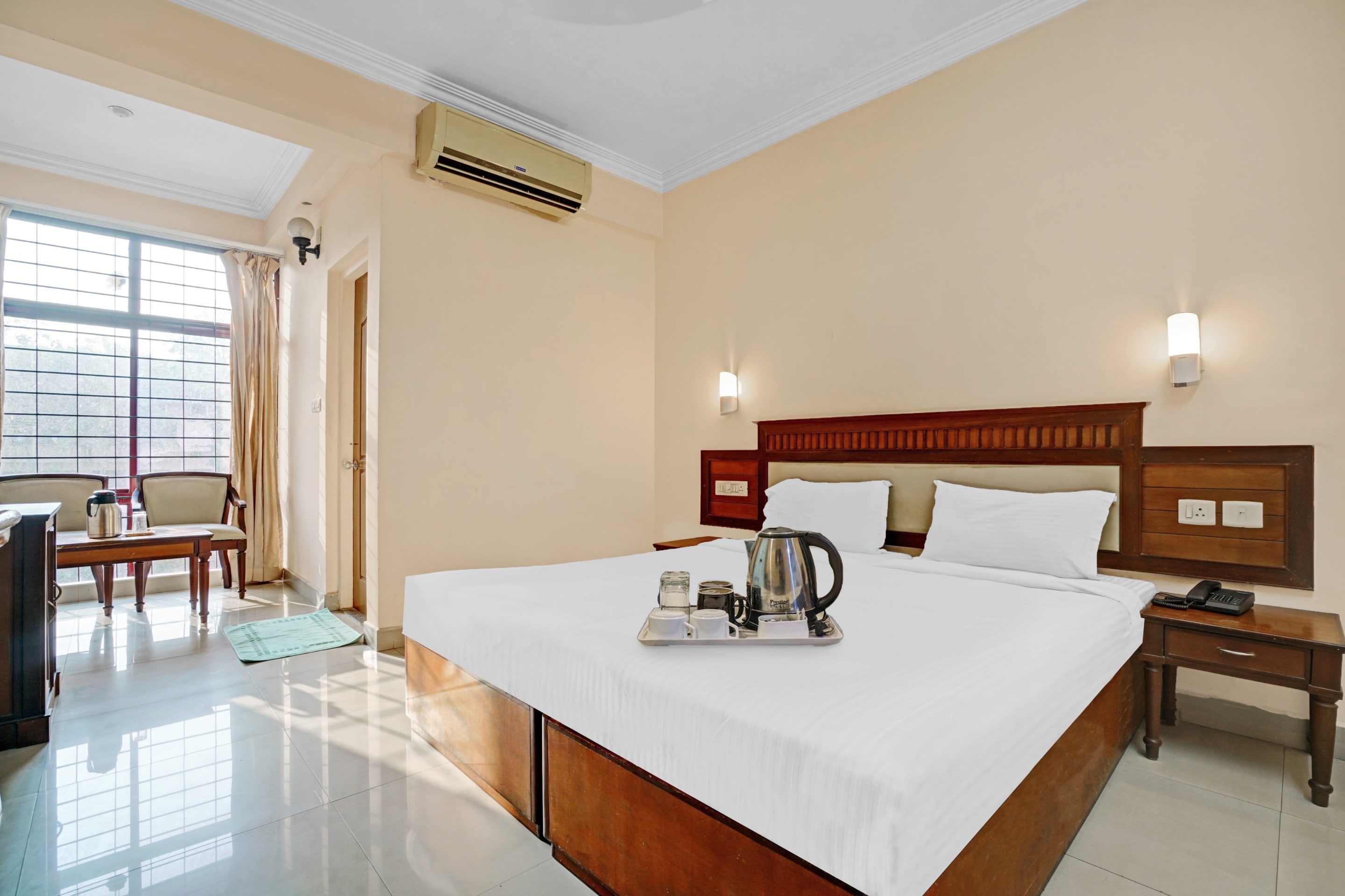 Collection O Hotel Mali - Tap to explore photos