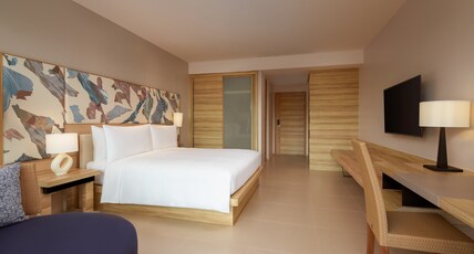 Le Meridien Phuket Mai Khao Beach Resort Room Type - Deluxe Guest room, 1 King, Garden view, Balcony for 2 Persons(3rd person with additional charged) Le Meridien Phuket Mai Khao Beach Resort Room Type - Deluxe Guest room, 1 King, Garden view, Balcony for 2 Persons(3rd person with additional charged)