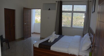 Shivalik Riverine | Homestay with a Kitchen Room Type - Family Room with Balcony