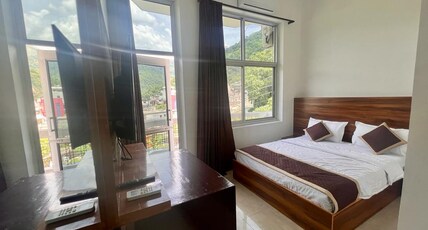 Hotel Manikut Room Type - Small Deluxe Balcony Room with Garden View (1st Floor)