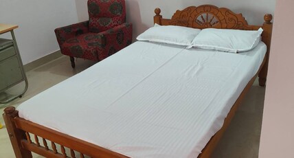 Cozy Room Opposite GMC Hospital Parippally Room Type - Standard Double Room AC