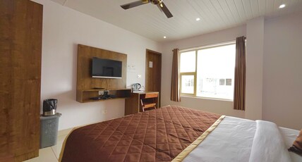 Lucent - The Homely Stay Room Type - Deluxe Rooms