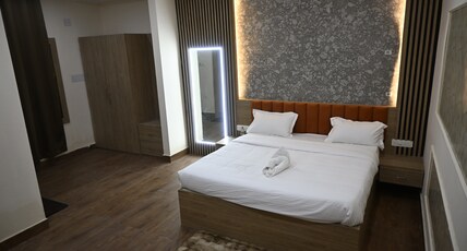 Hota Residency. Room Type - Deluxe Room