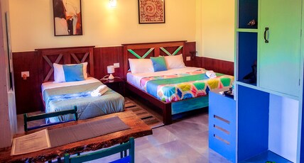 Date Palm Homestay Room Type - Family Premium Room with Balcony