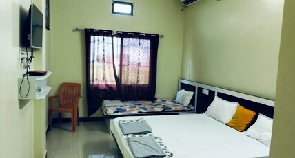 Hotel shree ganga Room Type - AC ROOM 3 BED