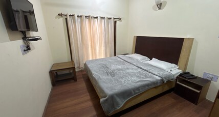 Hotel Grass Land Room Type - Deluxe room