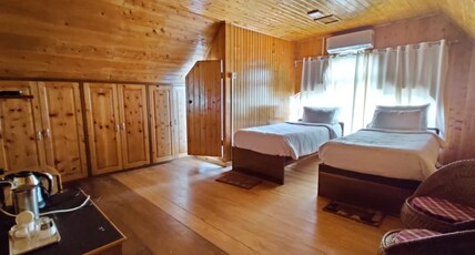 Grey Stone Hotel kalimpong Room Type - Delux Wooden Attic