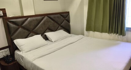 Hotel Swagat Inn CG Road Room Type - Deluxe Room