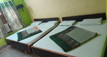 Gayatri guest house Room Type - Four Bed Non -AC Room