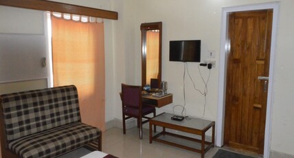 Pradyut Hotel Room Type - Deluxe Room AC