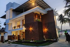 Quilon lake inn
