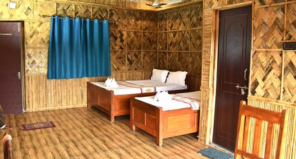 KALYAN LAKE RESORT Room Type - Triple Bed First Floor AC - Bamboo Cottage KALYAN LAKE RESORT Room Type - Triple Bed First Floor AC - Bamboo Cottage