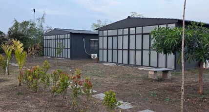 Dhanishtha's Resort Room Type - Deluxe Room with Garden View