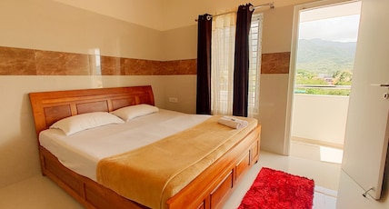 Kutralam Ezhilagam Hotel Room Type - Deluxe Studio Room with Balcony AC - MARUTHAM Kutralam Ezhilagam Hotel Room Type - Deluxe Studio Room with Balcony AC - MARUTHAM