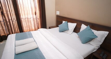 Hotel Lotus Near Rankala Lake Room Type - Super Deluxe Room AC