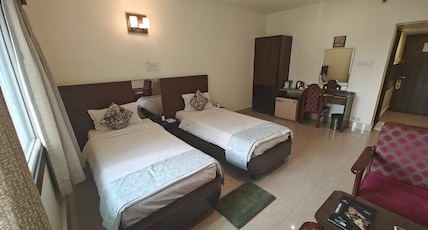 Hotel Radhika Regency Room Type - Standard AC - Twin Bed Hotel Radhika Regency Room Type - Standard AC - Twin Bed
