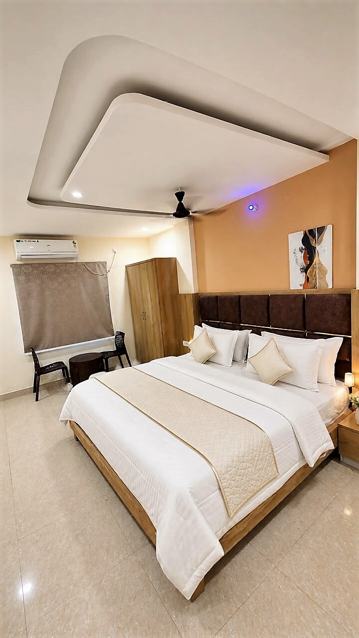 Kashika Inn & Comfort Stays - Tap to explore photos