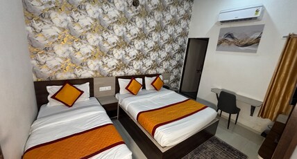 Hotel Hanuman Palace (Free Gated Parking & 10 Minutes from Temple) Room Type - Deluxe Triple Room ( 1 Double Bed + 1 Single Bed | 3 Pax )