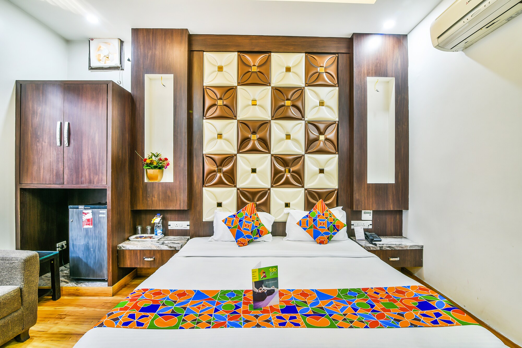 FabHotel Aman Residency - Tap to explore photos