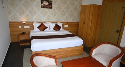Theertha Inn Wayanad Room Type - Deluxe Room