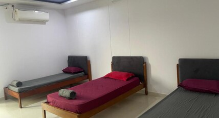 Elysium Inn Service Apartment Room Type - Economy Triple Room