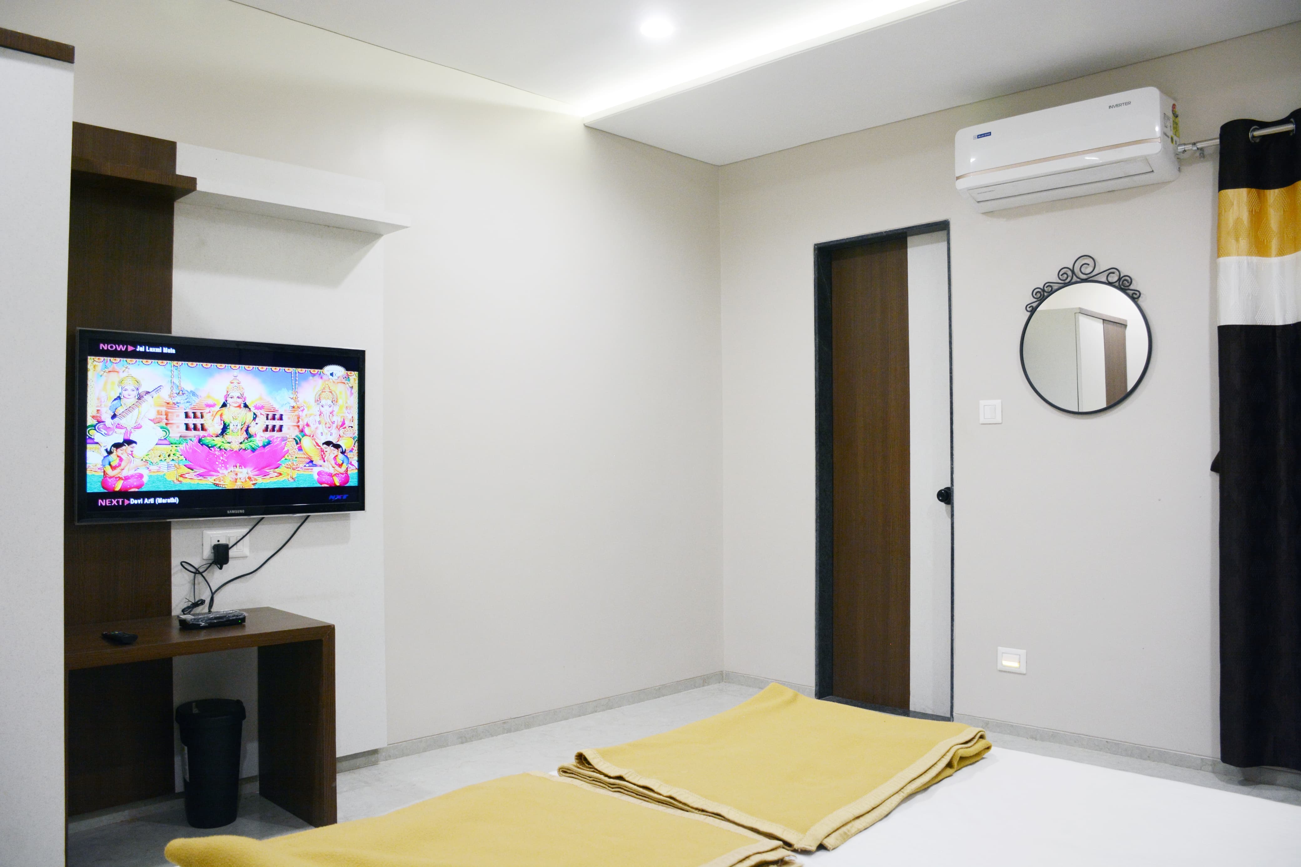 Samarth Lodge ( Samarth Inn) - Tap to explore photos