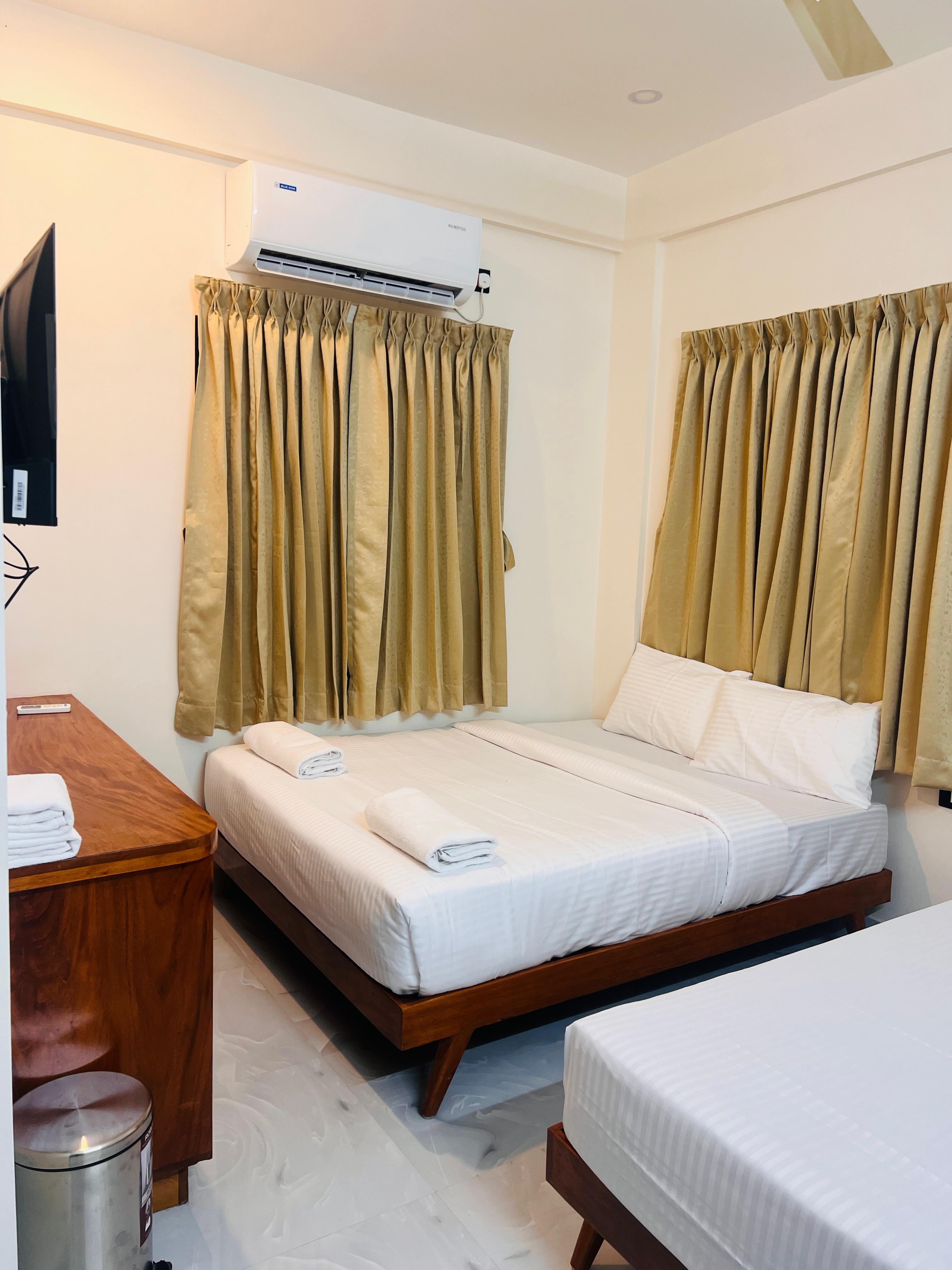 Vallimony Luxury Stays- Padmanabhaswamy Temple - Tap to explore photos