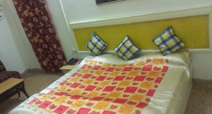 Raj Kumbh Guest House Room Type - Economy Triple