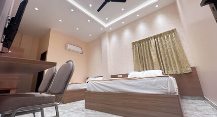 P.M.M Mahal Room Type - Deluxe Double Room With AC
