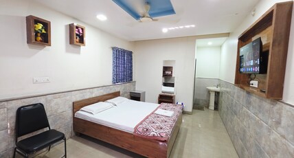 Shivanand Lodging Room Type - Deluxe Room with Hill View