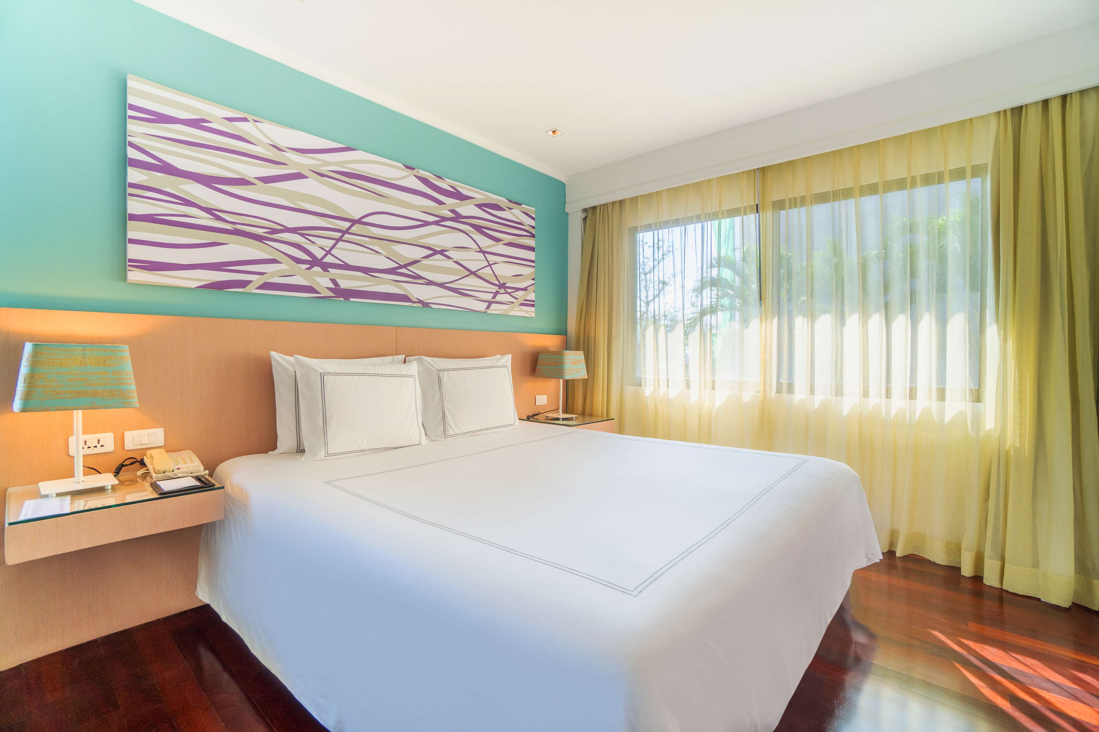 Radisson Resort & Suites Phuket - Tap to explore photos