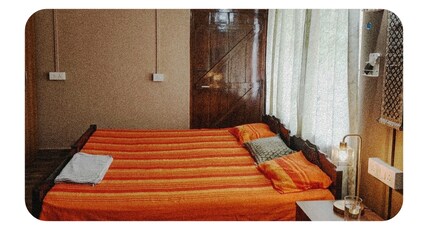 The Heritage Estate Room Type - All brown suite with Ac, attached washroom and a private living space