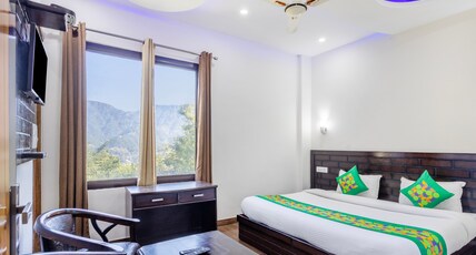Treebo Anjukul Room Type - Economy Room with Mountain View