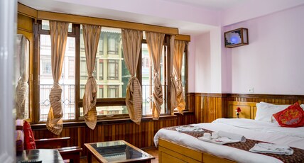 Doma Residency ( MG Marg ) Room Type - Executive King Mg Marg City View