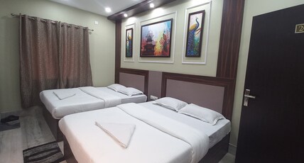 HOTEL SREE DURGA Room Type - AC Deluxe Four Bed