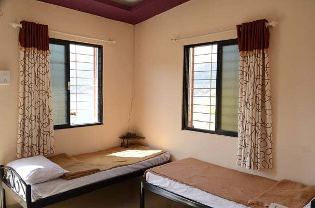 Double Bedroom With Lakeview - Tap to explore photos
