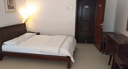 Mega Inn Room Type - Deluxe NON AC Room - Twin Bed