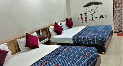 sanskar hotel Room Type - Four Bed Ac Room