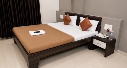 OM EXECUTIVE LODGE Room Type - Deluxe Non AC Room