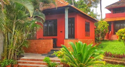 Blue Water Beach Resort Room Type - Sea Facing AC Deluxe Cottage