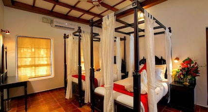 Kovilakam Heritage Resort Room Type - Executive Suite with River View Balcony Kovilakam Heritage Resort Room Type - Executive Suite with River View Balcony