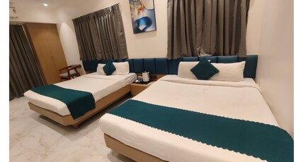 Kiara Eshosans Palace (100 meters From Sai Samadhi Temple) Room Type - Luxury Four Bed Room Kiara Eshosans Palace (100 meters From Sai Samadhi Temple) Room Type - Luxury Four Bed Room