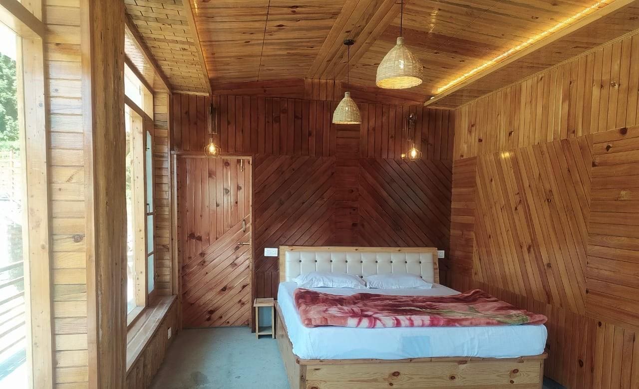 Trekker's Nest Riverside Resort - Tap to explore photos