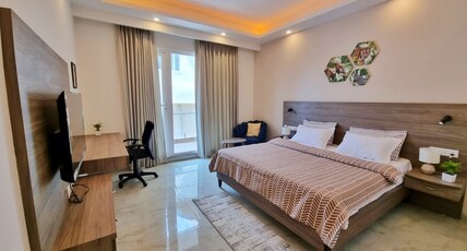 Flock Hotel I Golf Course Road Near Dlf Phase 1 Metro station I Gurugram Room Type - Premium Double Room