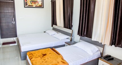 Hotel Shiv Kripa  Room Type - Budget Triple Room