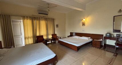Neelkanthi Krishna Dham Room Type - Deluxe 4 Bedded Room